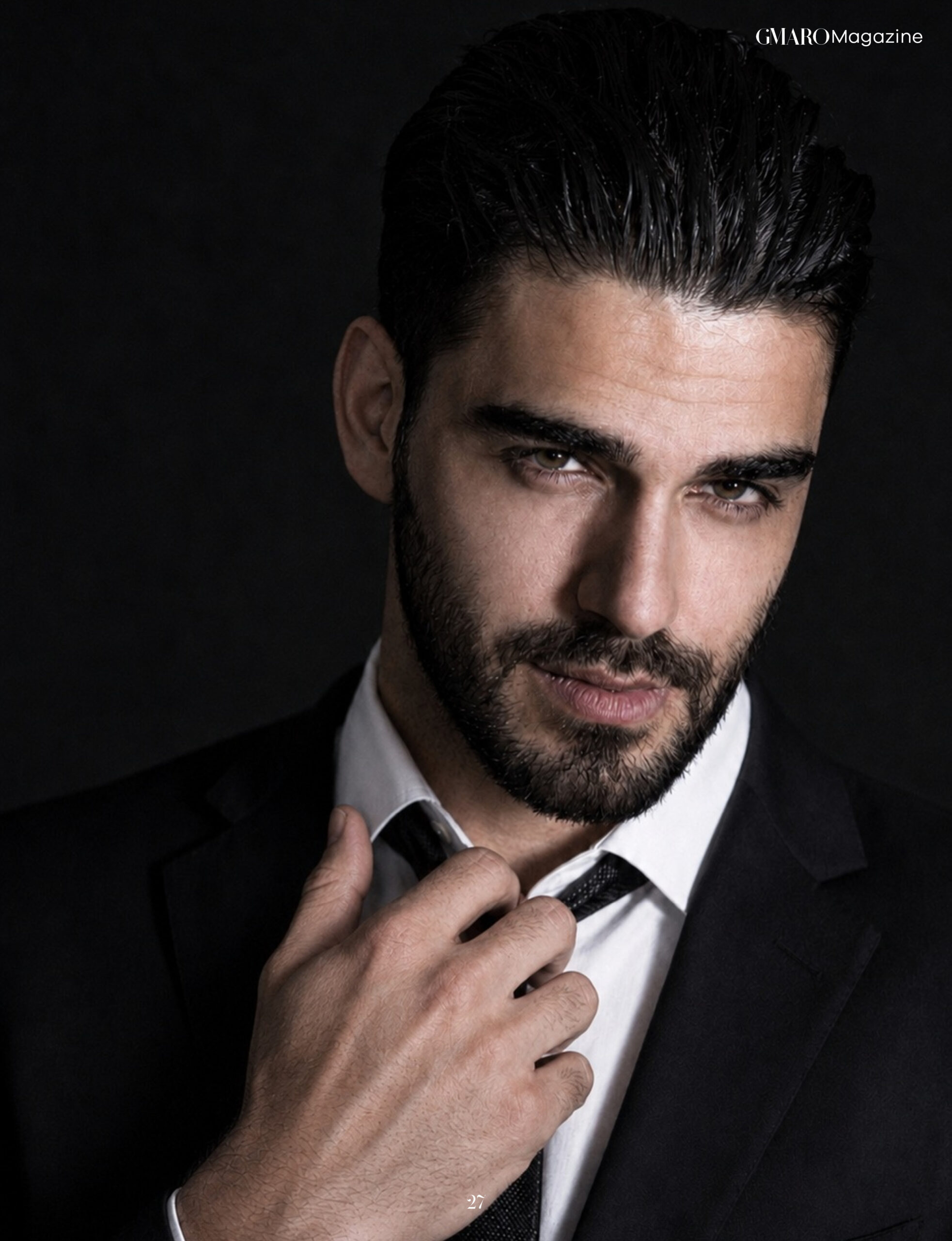 Firat Zan GMARO editorial black suit portrait 2026
